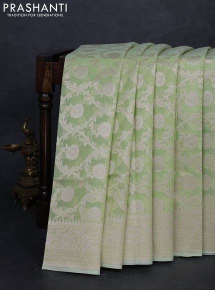 Banarasi silk cotton saree pista green with allover thread & zari woven brocade weaves and temple design thread & zari woven border