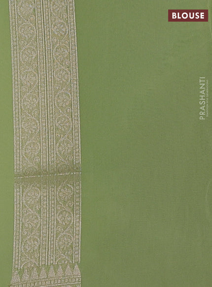 Banarasi silk cotton saree pista green with allover thread & zari woven brocade weaves and temple design thread & zari woven border