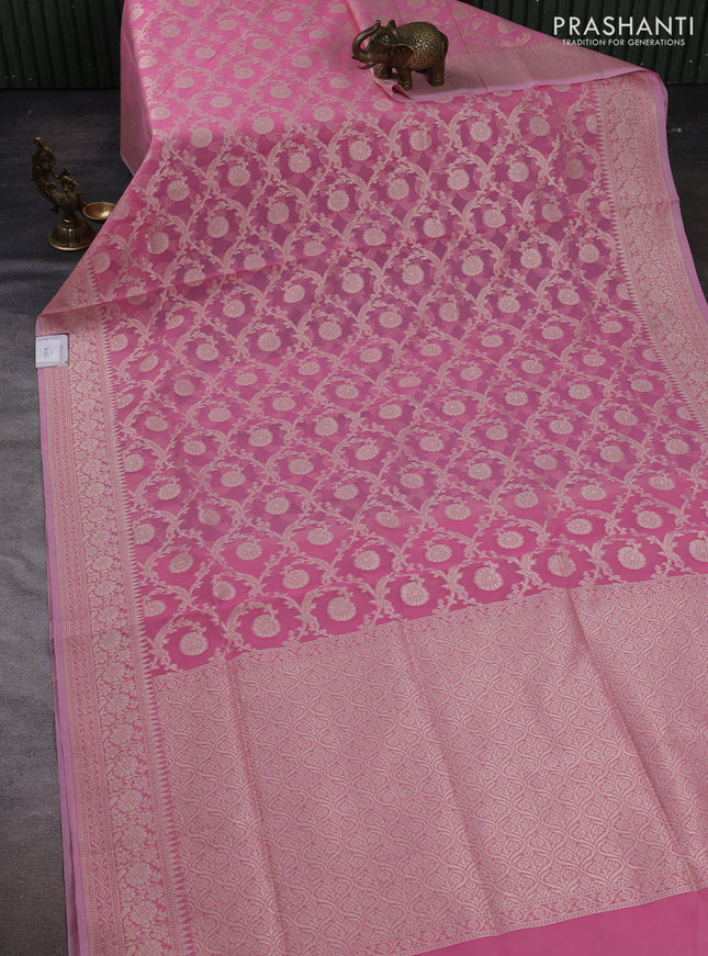 Banarasi silk cotton saree light pink with allover thread & zari woven brocade weaves and temple design thread & zari woven border