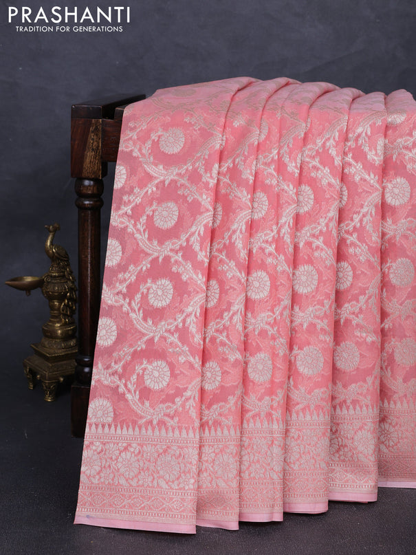Banarasi silk cotton saree peach pink with allover thread & zari woven brocade weaves and temple design thread & zari woven border