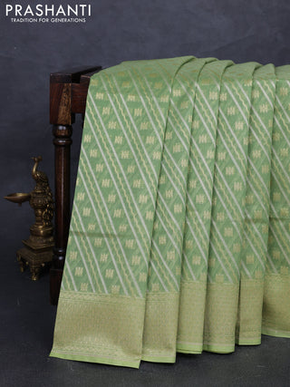 Banarasi silk cotton saree light green with allover silver & gold zari woven brocade weaves and zari woven border