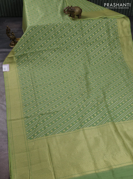 Banarasi silk cotton saree light green with allover silver & gold zari woven brocade weaves and zari woven border
