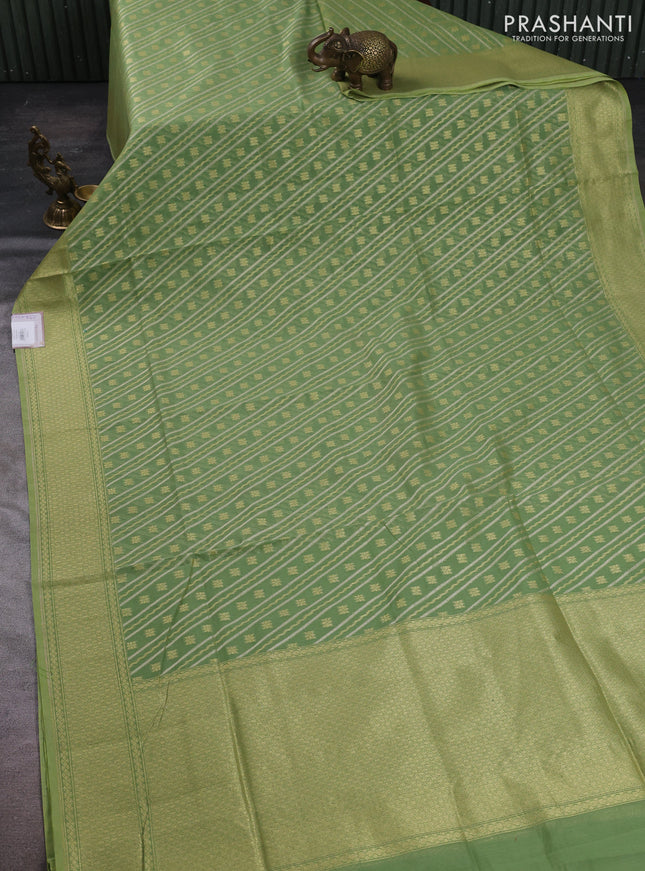 Banarasi silk cotton saree light green with allover silver & gold zari woven brocade weaves and zari woven border