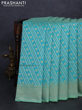 Banarasi silk cotton saree teal blue with allover silver & gold zari woven brocade weaves and zari woven border