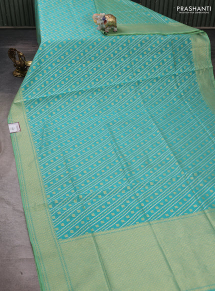 Banarasi silk cotton saree teal blue with allover silver & gold zari woven brocade weaves and zari woven border