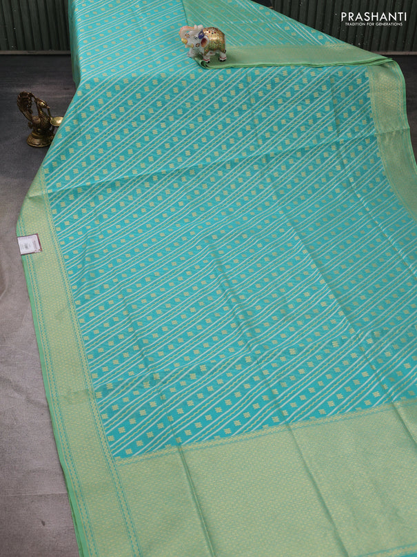 Banarasi silk cotton saree teal blue with allover silver & gold zari woven brocade weaves and zari woven border