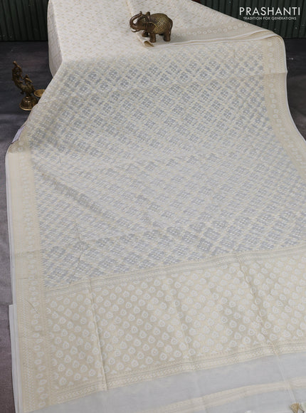 Banarasi silk cotton saree off white with allover thread & zari woven brocade weaves and thread & zari woven border