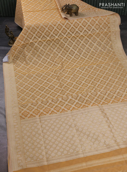 Banarasi silk cotton saree sandal with allover thread & zari woven brocade weaves and thread & zari woven border
