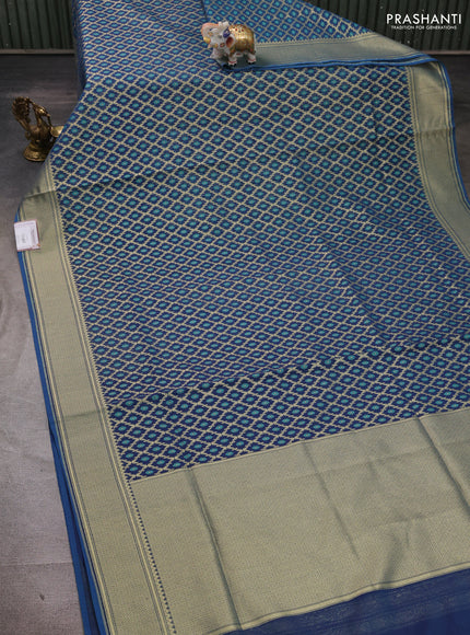 Banarasi silk cotton saree peacock blue with allover thread & zari woven brocade weaves and temple design zari woven border