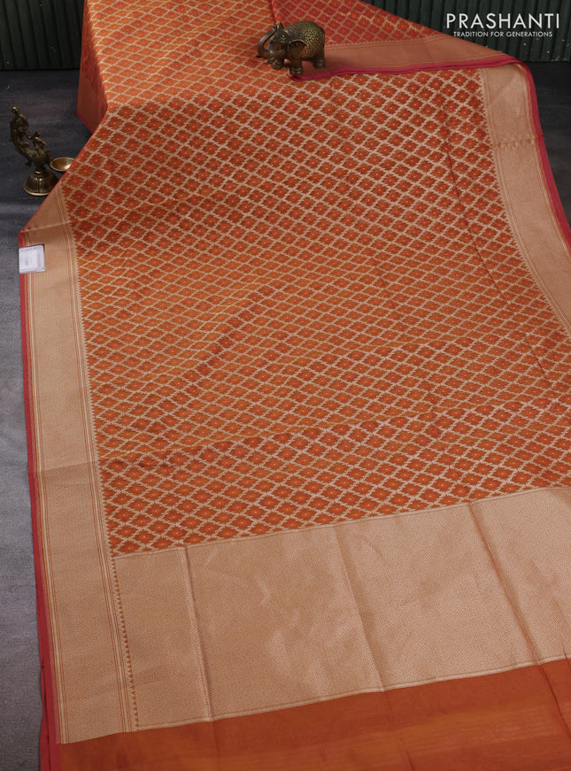 Banarasi silk cotton saree rust shade with allover thread & zari woven brocade weaves and temple design zari woven border