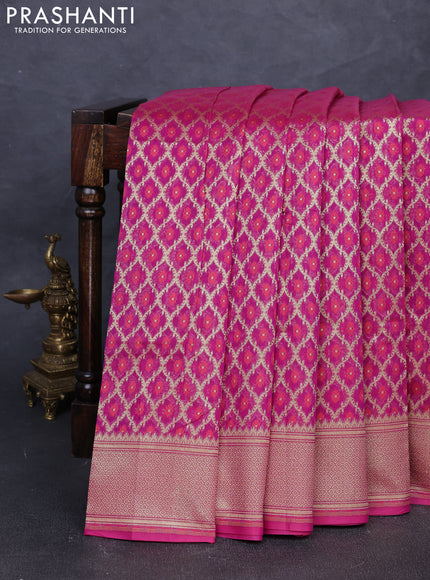 Banarasi silk cotton saree magenta pink with allover thread & zari woven brocade weaves and temple design zari woven border