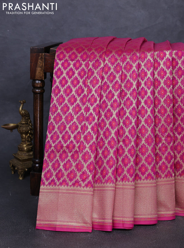 Banarasi silk cotton saree magenta pink with allover thread & zari woven brocade weaves and temple design zari woven border
