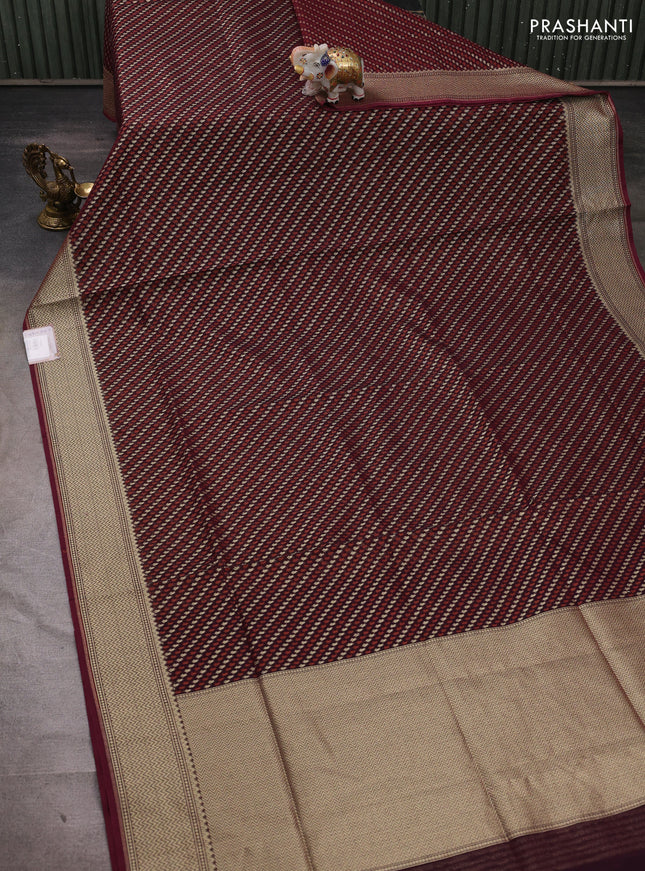 Banarasi silk cotton saree deep maroon with allover thread & zari woven brocade weaves and temple design zari woven border