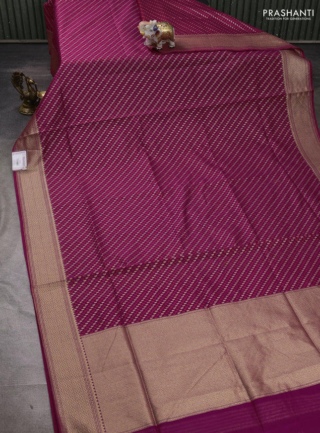 Banarasi silk cotton saree magenta pink with allover thread & zari woven brocade weaves and temple design zari woven border