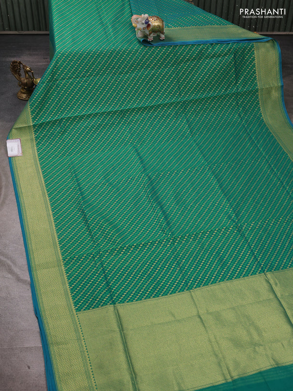 Banarasi silk cotton saree green with allover thread & zari woven brocade weaves and temple design zari woven border