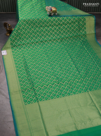 Banarasi silk cotton saree green with allover thread & zari woven brocade weaves and temple design zari woven border
