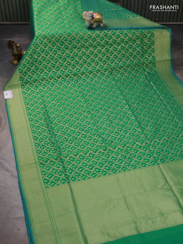 Banarasi silk cotton saree green with allover thread & zari woven brocade weaves and temple design zari woven border