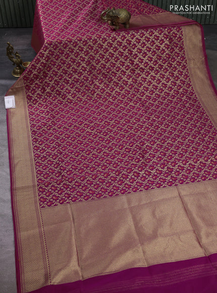 Banarasi silk cotton saree magenta pink with allover thread & zari woven brocade weaves and temple design zari woven border