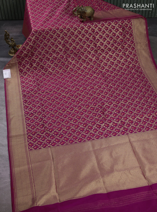 Banarasi silk cotton saree magenta pink with allover thread & zari woven brocade weaves and temple design zari woven border