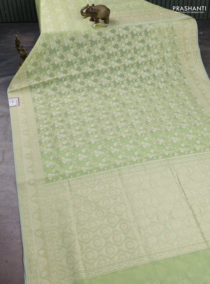 Banarasi silk cotton saree light green with allover thread & zari woven brocade weaves and zari woven border