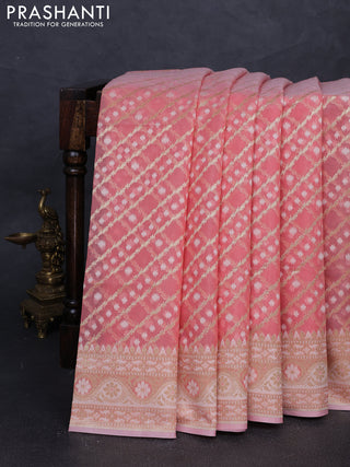 Banarasi silk cotton saree peach shade with allover thread & zari woven brocade weaves and thread & zari woven border