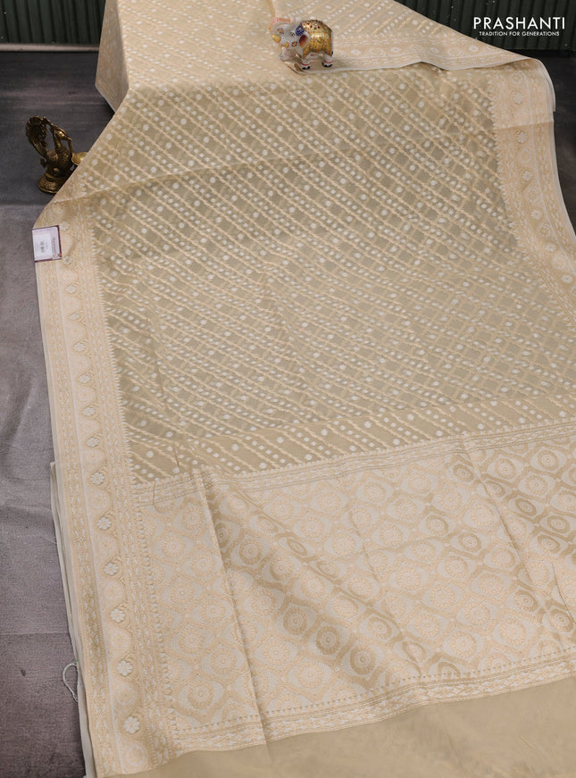 Banarasi silk cotton saree beige with allover thread & zari woven brocade weaves and thread & zari woven border