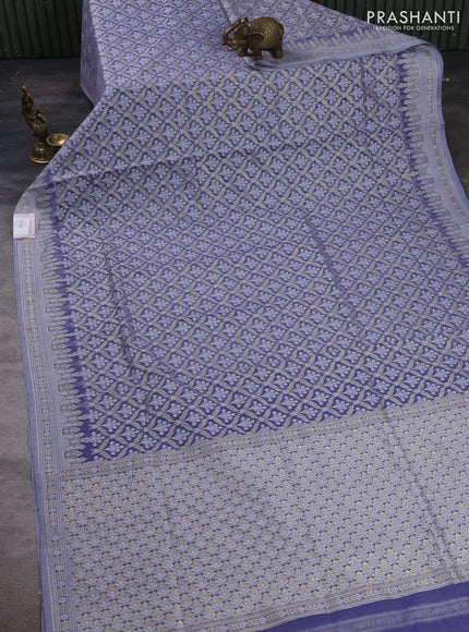 Banarasi silk cotton saree pastel lavender with allover thread & zari woven brocade weaves and thread & zari woven border
