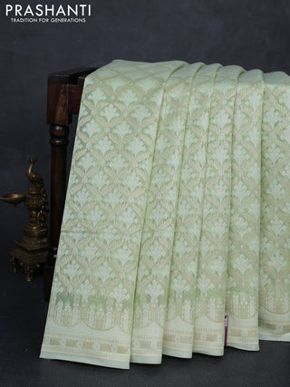 Banarasi silk cotton saree mild pista green with allover thread & zari woven brocade weaves and thread & zari woven border