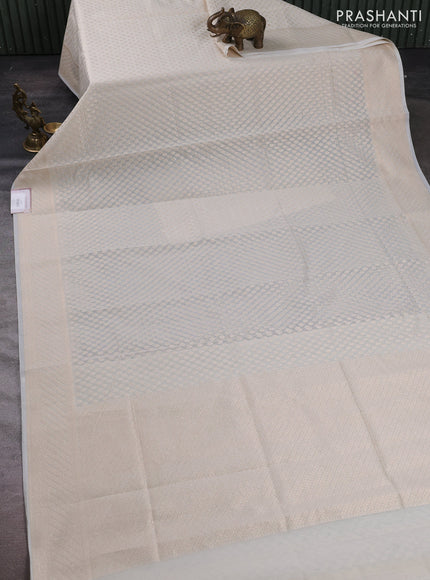 Banarasi silk cotton saree off white with allover zari woven buttas and zari woven border