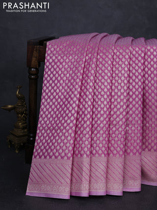 Banarasi silk cotton saree mauve pink with allover zari woven buttas and zari woven border