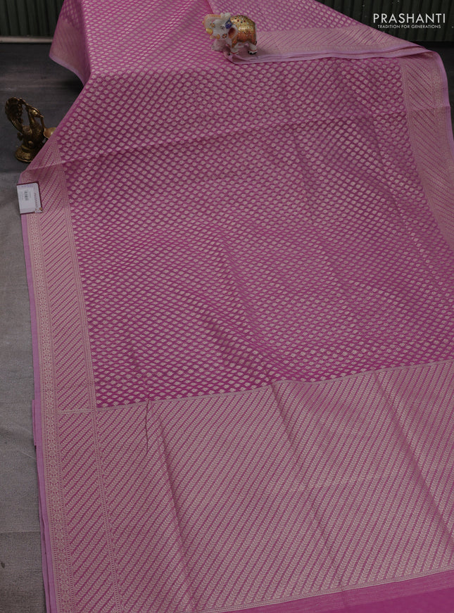 Banarasi silk cotton saree mauve pink with allover zari woven buttas and zari woven border