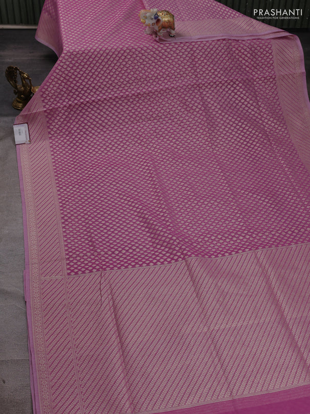 Banarasi silk cotton saree mauve pink with allover zari woven buttas and zari woven border