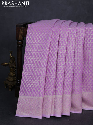 Banarasi silk cotton saree lavender with allover zari woven buttas and zari woven border