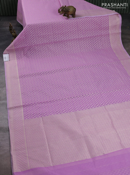 Banarasi silk cotton saree lavender with allover zari woven buttas and zari woven border