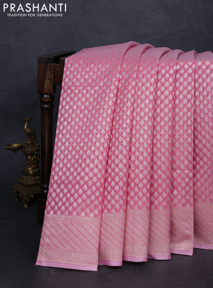 Banarasi silk cotton saree peach pink with allover zari woven buttas and zari woven border