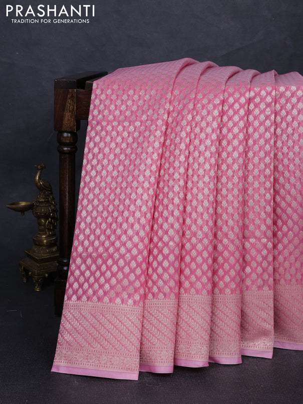 Banarasi silk cotton saree peach pink with allover zari woven buttas and zari woven border