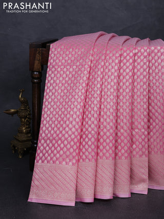 Banarasi silk cotton saree peach pink with allover zari woven buttas and zari woven border