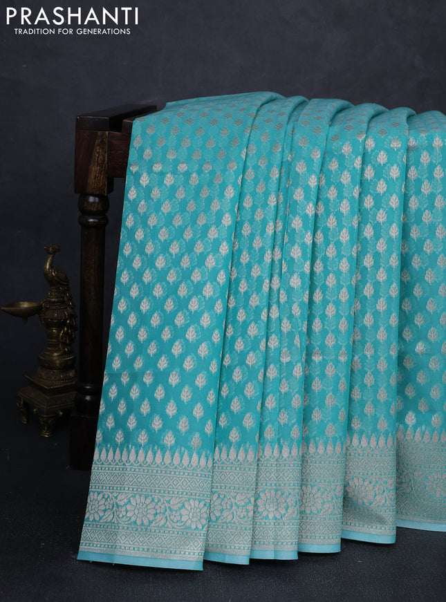 Banarasi silk cotton saree teal green with allover thread & zari woven buttas and thread & zari woven border