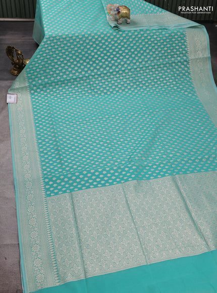 Banarasi silk cotton saree teal green with allover thread & zari woven buttas and thread & zari woven border