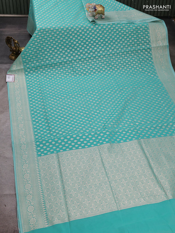 Banarasi silk cotton saree teal green with allover thread & zari woven buttas and thread & zari woven border