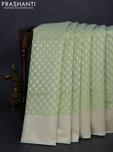 Banarasi silk cotton saree light green with allover thread & zari woven buttas and thread & zari woven border