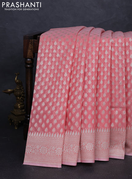 Banarasi silk cotton saree peach shade with allover thread & zari woven buttas and thread & zari woven border