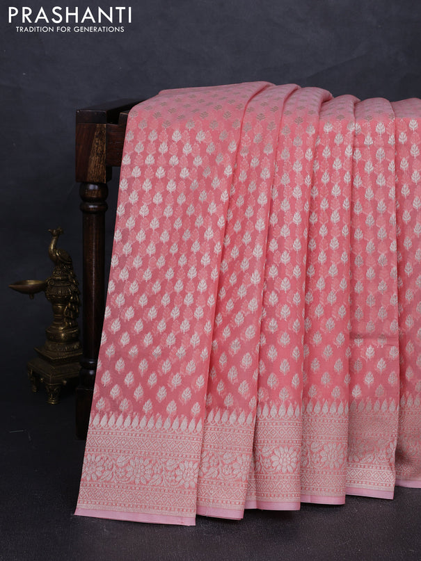 Banarasi silk cotton saree peach shade with allover thread & zari woven buttas and thread & zari woven border