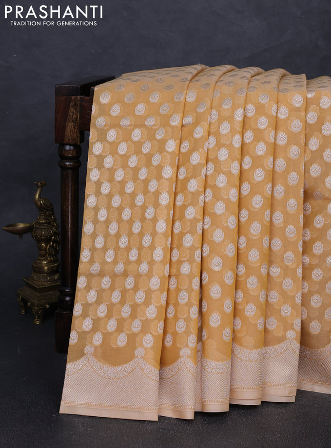 Banarasi silk cotton saree pale yellow with allover thread & zari woven buttas and thread & zari woven border