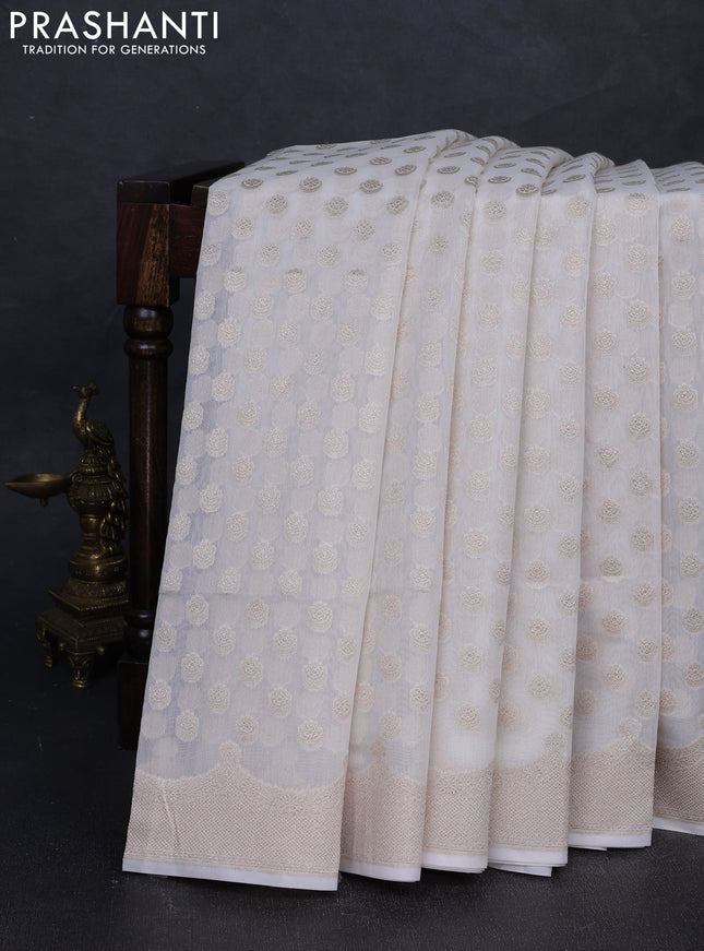 Banarasi silk cotton saree off white with allover thread & zari woven buttas and thread & zari woven border