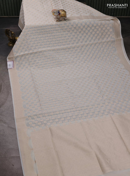Banarasi silk cotton saree off white with allover thread & zari woven buttas and thread & zari woven border
