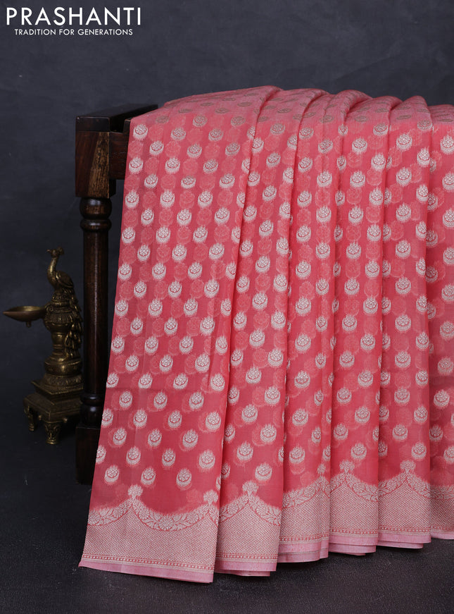 Banarasi silk cotton saree peach shade with allover thread & zari woven buttas and thread & zari woven border