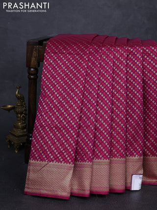 Banarasi silk cotton saree magenta pink with allover thread & zari woven buttas and temple design zari woven border