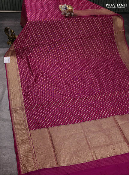 Banarasi silk cotton saree magenta pink with allover thread & zari woven buttas and temple design zari woven border