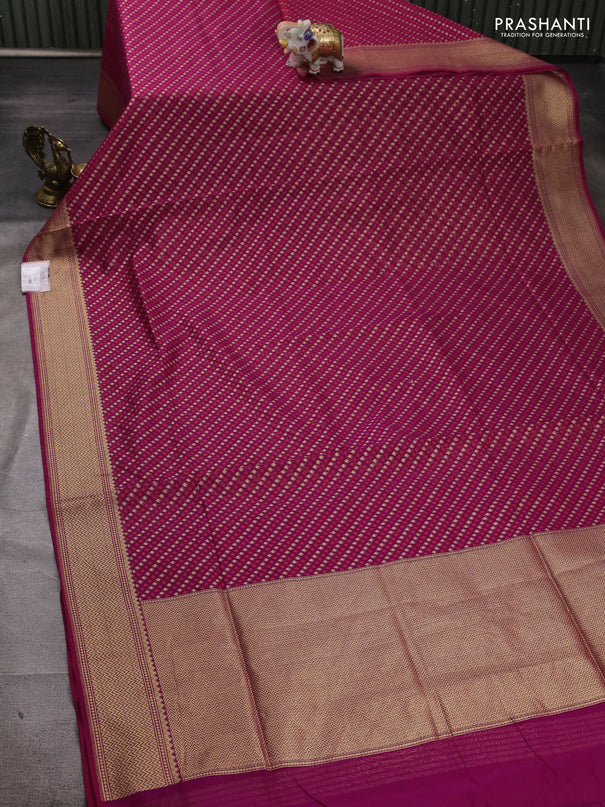 Banarasi silk cotton saree magenta pink with allover thread & zari woven buttas and temple design zari woven border
